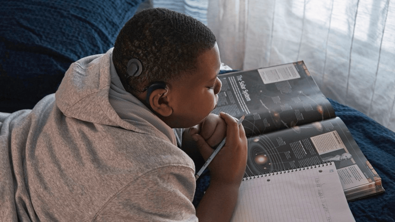 DuJuan smiling and enjoying everyday sounds