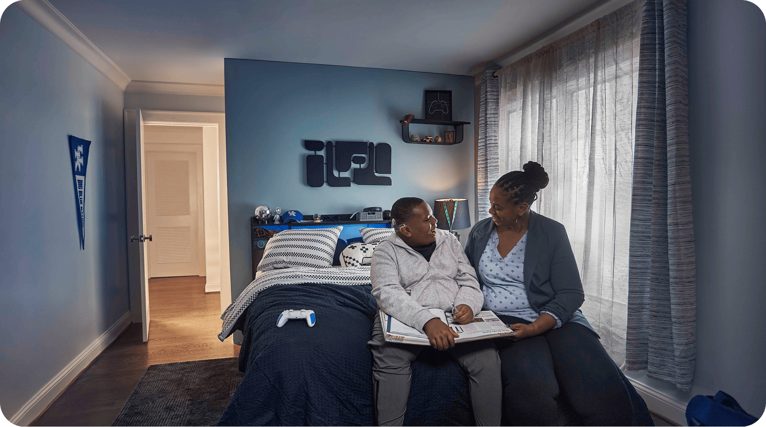 DuJuan smiling, enjoying typical teenage life after his cochlear implant